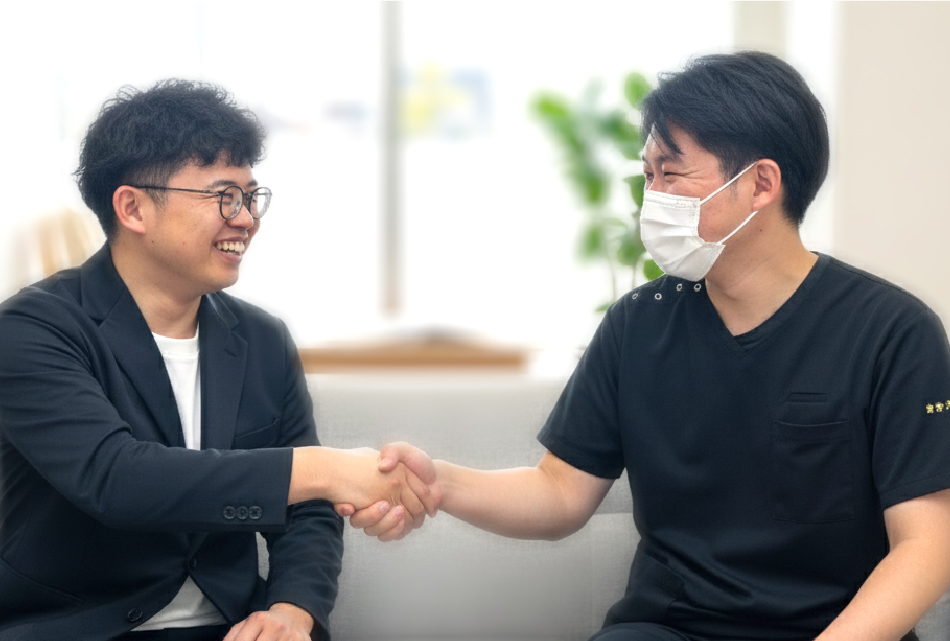 理事長との握手